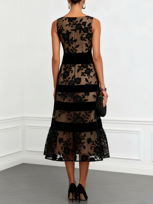 Solène | Robe midi trapèze en tulle noir à imprimé floral et sans manches