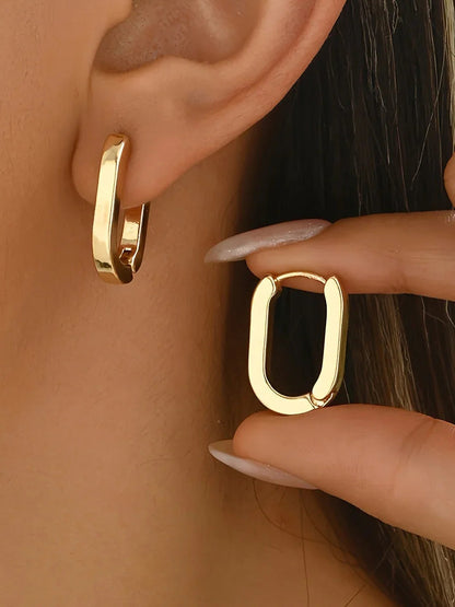 Queenie | Ovala geometriska creoler, guld
