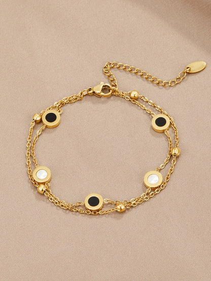 Ursula | Armband med onyx och vit sten, guld
