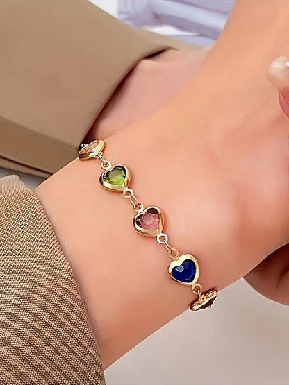 Violet | Armband med hjärtberlocker, guld
