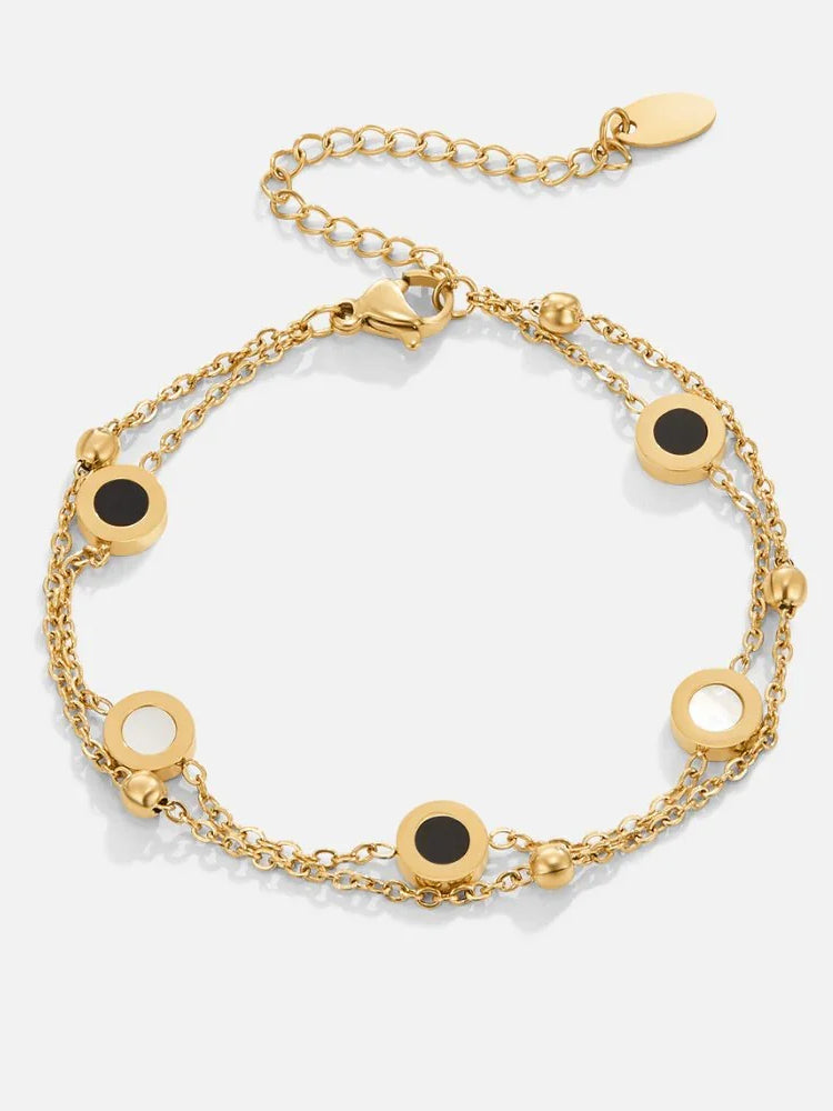 Ursula | Armband med onyx och vit sten, guld